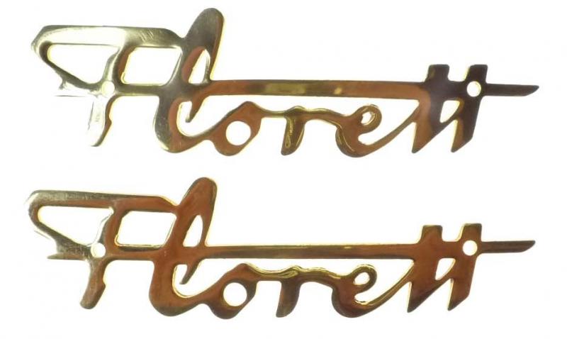Goudkleurig metalen embleem "Florett". Set van twee stuks, zolang de huidige voorraad strekt voor...